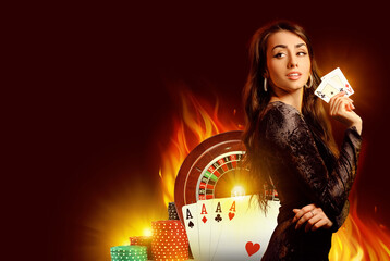 Woman in black dress showing two aces. Standing sideways on burgundy background with playing cards, roulette and chips. Poker, casino. Close-up