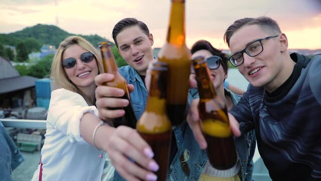 Happy People Making Photo With Beer Outdoors. Friends Party, Drinking And Having Fun Camera Point Of View