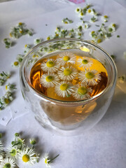 chamomile tea in a transparent cup