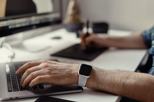 Graphic Designer working hands with interactive pen display, digital Drawing tablet and Pen. Concept of young people works mobile devices.