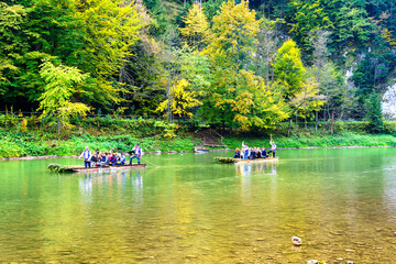 DUNAJEC RIVER, POLAND - OCT 7, 2018: Tourists raft on the Dunajec river to Kroscienko or Szczawnica...