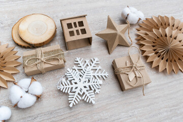 Fototapeta na wymiar Christmas and zero waste, eco friendly packaging gifts in kraft paper.