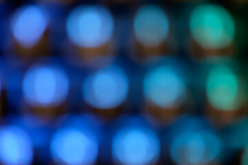 Abstract colorful  blurred bokeh light on dark background.Technology and discotheques concept.