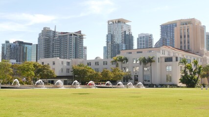 City park near San Diego county civic center in downtown, California coast, USA. Urban skyline,...