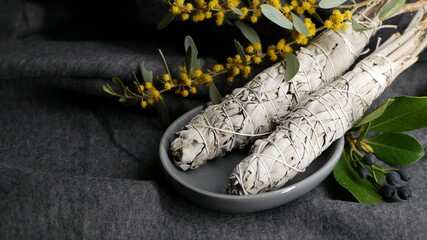 Dried white sage smudge stick, relaxation and aromatherapy. Smudging during psychic occult...