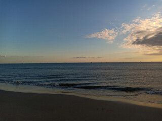 Fototapeta na wymiar beach with a sunset background