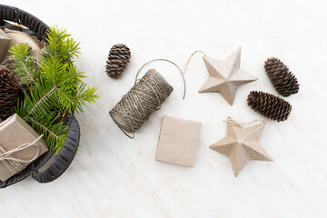 Hand crafted gifts with natural Christmas decorations without plastic. Wicker basket