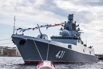 close-up military warship in the water area of the neva