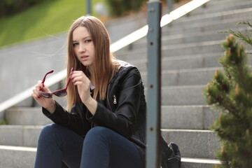 Beautiful young girl walking outdoors