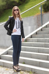 Beautiful young girl walking outdoors