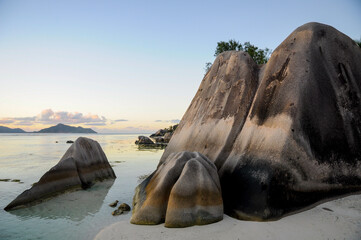 Scenic view of a big boulders of granite rock on the beach at Anse Source d'Argent. La Digue Island, Seychelles