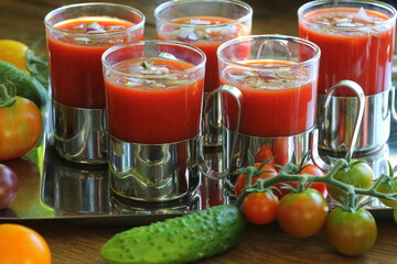 Homemade tomato Gazpacho soup in glass bowl. Healthy eating concept.