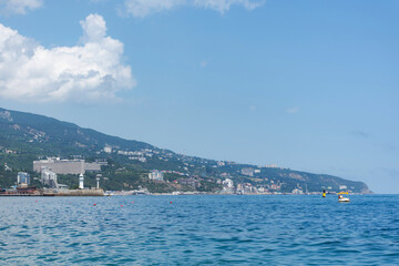 View of the city of Yalta from the sea on July 04, 2019. Tourist vacation in the Crimea. The journey on the ship.