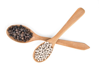 Black pepper and White pepper spice was placed on a white background