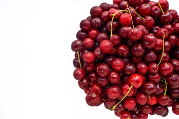 Red juicy ripe cherry on a white background.