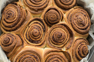 Fresh rolls Cinnabon, Cinnamon rolls in the form. Flavorful pastries