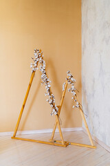 flowers of cotton on wooden bars for interior decoration