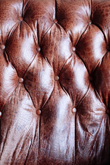 Closeup texture of vintage brown leather sofa