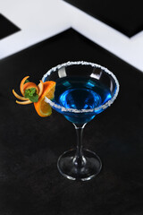 Art in orange- cocktail Blue lagoon