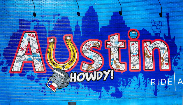 Austin, Texas, March 14, 2019. "Austin Howdy" wall painting at 6th street  with Texas symbolic