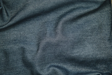Fototapeta na wymiar Dark navy denim jeans crumpled texture for design concept