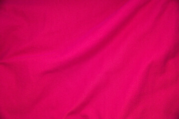 Fototapeta na wymiar Pink fabric crumpled texture for design concept