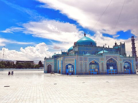 The twin blue domes of the Shrine of Hazrat Ali are One of Afghanistan's most iconic sights, and pilgrims come across the to pay their respects at the tomb contained inside.