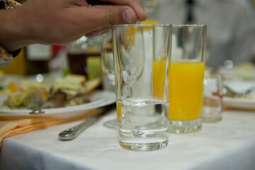 military stars with epaulettes in a glass of vodka. Lieutenant.