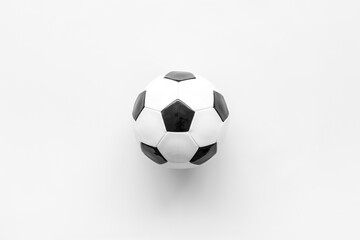 Obraz premium Soccer ball on white background top view copy space