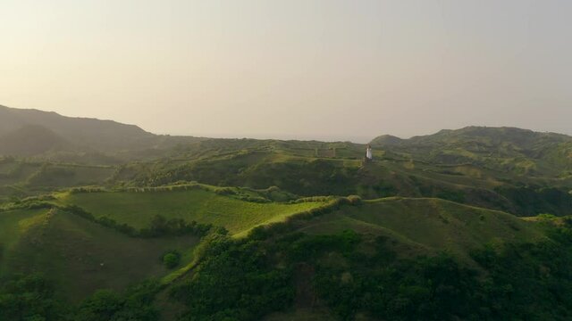 Aerial Approach lighthouse Batanes during Sunset