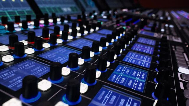 Broadcasting television Panel. Big Audio Mixing Board. Motion Camera. video contains vibration. Professional digital audio channel mixer.