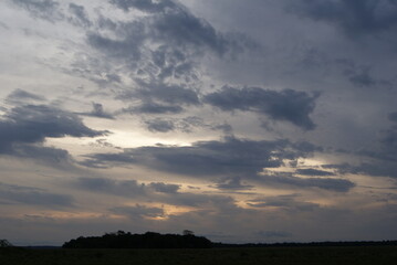 Sun behind clouds