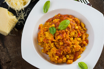 Rice and chicken breast cooked in tomato sauce.