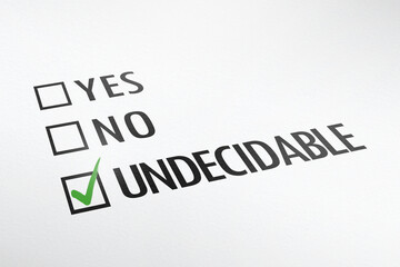 Funny questuionnaire: yes, no, undecidable. check mark and pen on paper. 