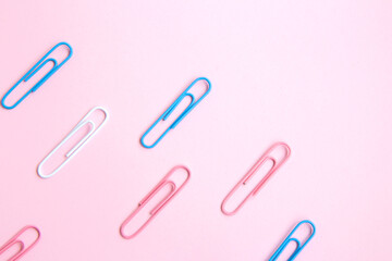 School stationery and supplies on a pink background with space for caption. Back to school, home school creative workspace. Minimalistic set of colorful stationery. Flat lay