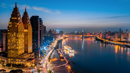 Fototapeta na wymiar Golden tall buildings along the Yangtze River in Chongqing, China