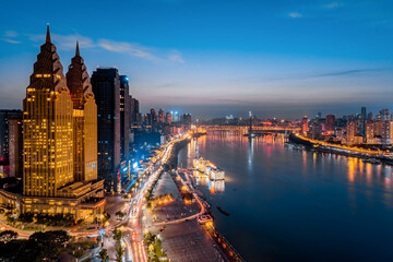 Golden tall buildings along the Yangtze River in Chongqing, China