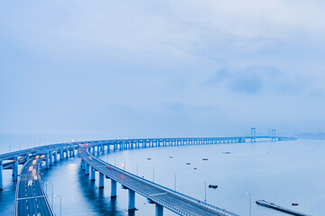 Fototapeta premium Night scenery of Dalian Sea Crossing Bridge, Liaoning, China