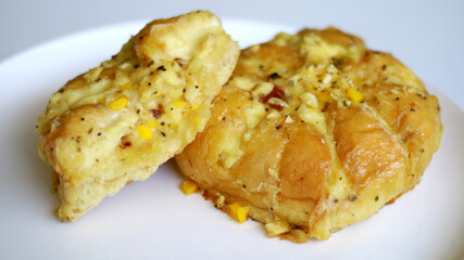 Korean garlic cheese bread on white background.