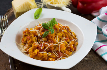 Rice and chicken breast cooked in tomato sauce.