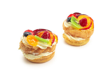 Home made cake with cream and fruit isolated