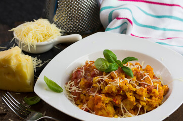 Rice and chicken breast cooked in tomato sauce.