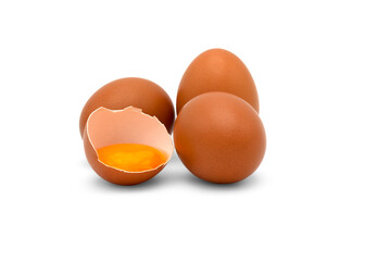 Three eggs and a half of chicken egg with yolk in egg shell isolated on white background.
