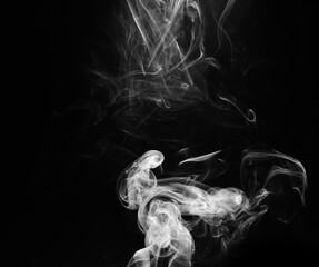 abstract fragment movement of white smoke on black background.