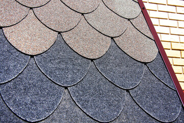 Samples of the roof of the roof. Bituminous tile of different types. Trade in building materials...