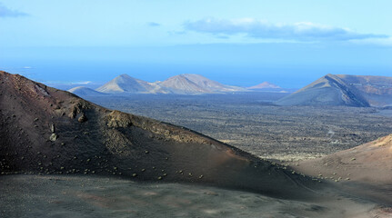 volcanic mountains at Timanfaya National Park, Lanzarote Island, Canary Islands, Spain © andreslebedev