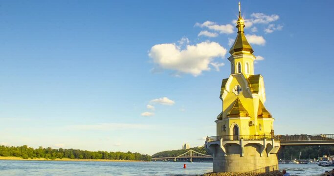 Beautiful timelapse of St. Nicolas Wondermaker Church on The river Dnieper. Tipical Kyiv (Kiev), Ukraine.