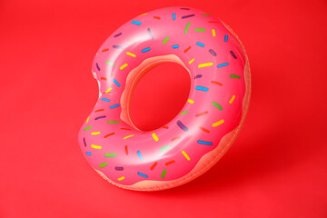 Inflatable ring on color background