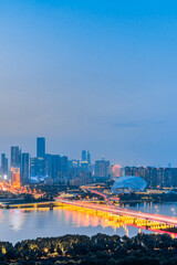 Night view of Shengjing Theater and urban buildings along the Hun River in Shenyang, Liaoning, China