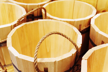 Wooden buckets with a rope handle. View from above.